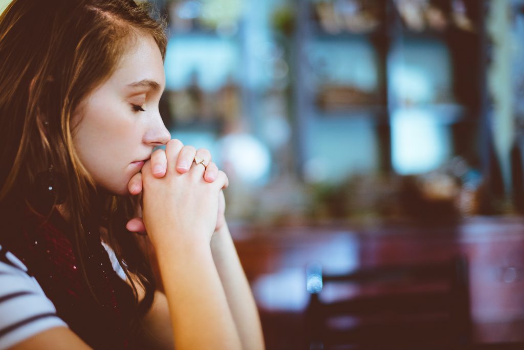 A woman praying the Jesus Prayer